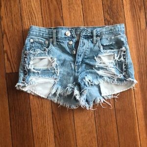 Distressed American Eagle festival shorts